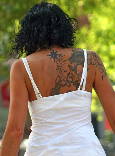 Flower Tattoo on Female Back 