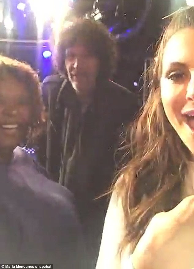 Sharing the moment: Howard stood in the background with Robin Quivers as Maria revealed the big news