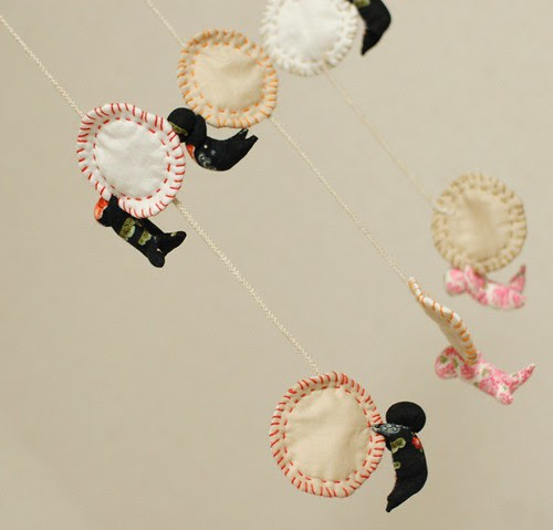 Sarubobo holding coin mobile