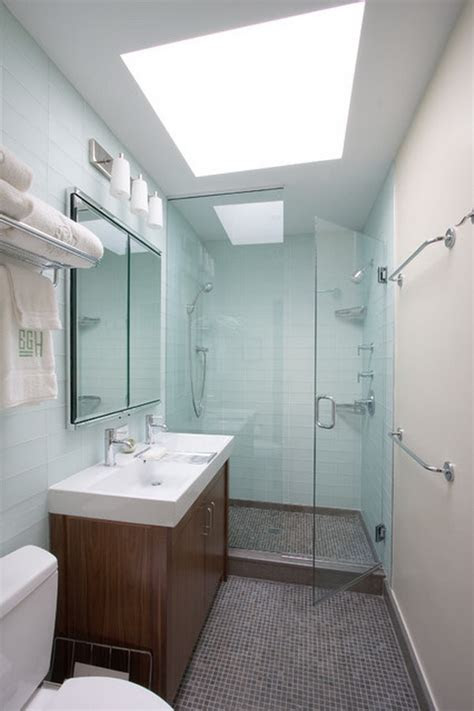 Kitchen sink with stainless steel countertop, wood cabinets, and deep drawers for storage. 6 Ways to Organize Small Bathroom Design to Relieve Stress