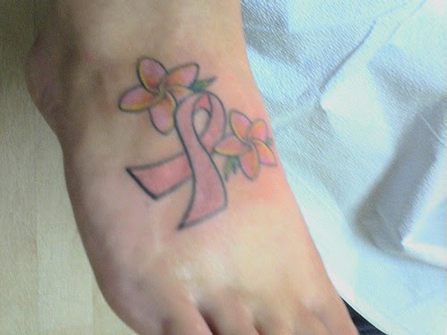 tattoo flowers breast