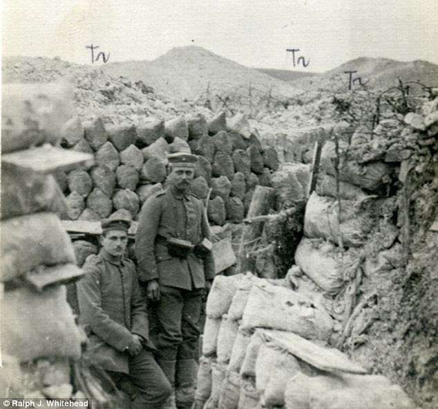 German soldiers of the 111th Reserve Infantry Regiment. The lips thrown up by the mine craters can be seen behind them