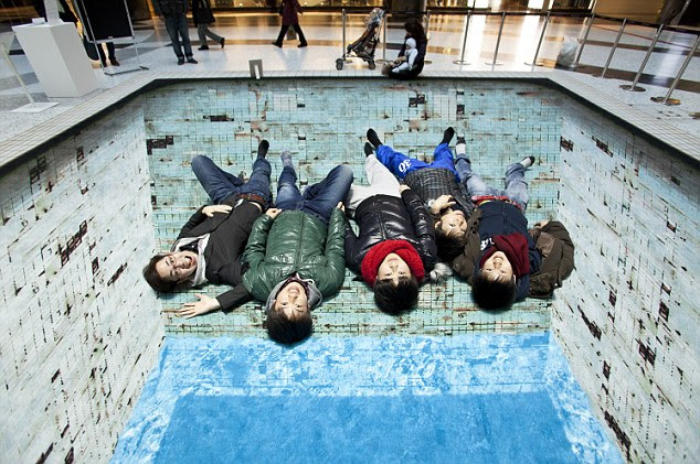 Doing the backstroke: A group of students line up for their photo opportunity