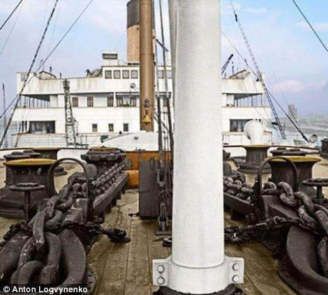 Under construction: Mr Logvynenko's coloured images show the Titanic from when it was being built (right) to the finished deck 