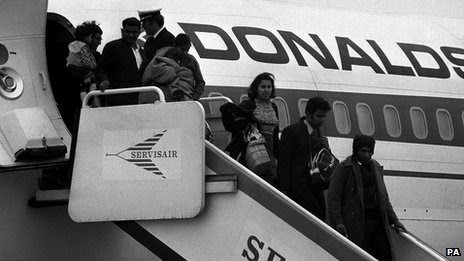 Asian immigrants from Uganda arrive in Britain in 1972