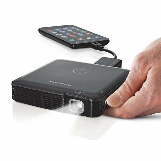I like this.  HDMI Pocket Projector for iPhone, iPad, etc.