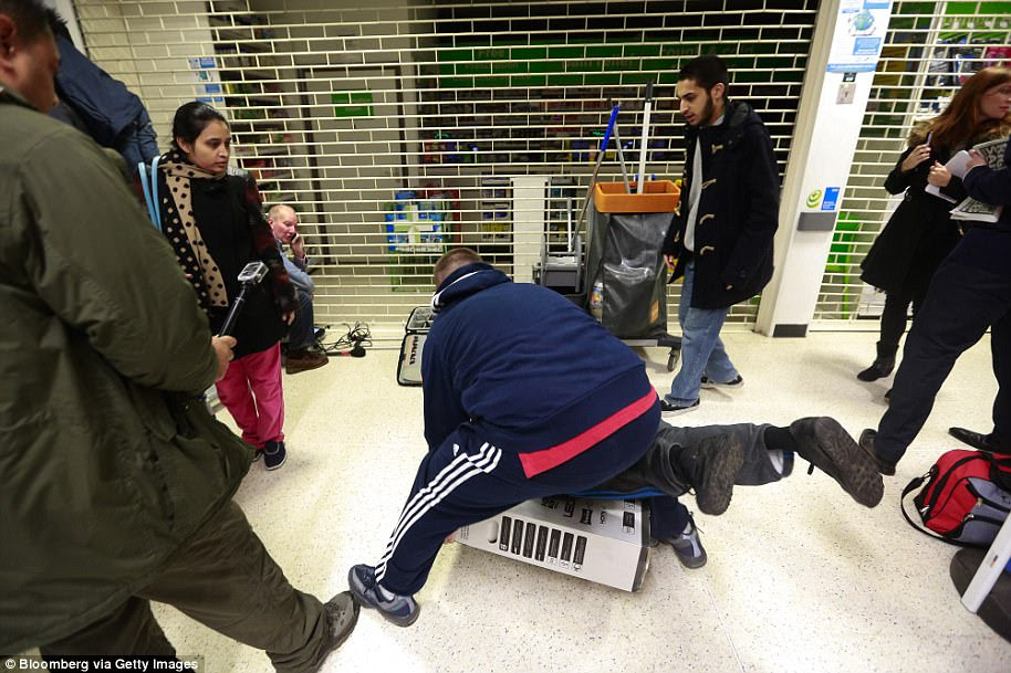 In previous years, some shoppers came to blows, such as these in Wembley, north west London as they attempted to by cheap televisons