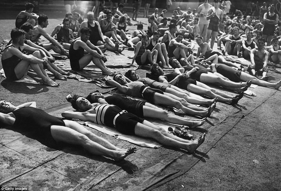 Londoners in bathing suits taking advantage of a heat wave at Hyde Park lido in June 1933