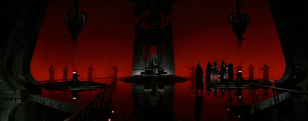 The next interesting new bit includes this wide shot of Supreme Leader Snoke, who gets in the line "Darkness rises...and light to meet it," which may or may not have made me very emotional.
