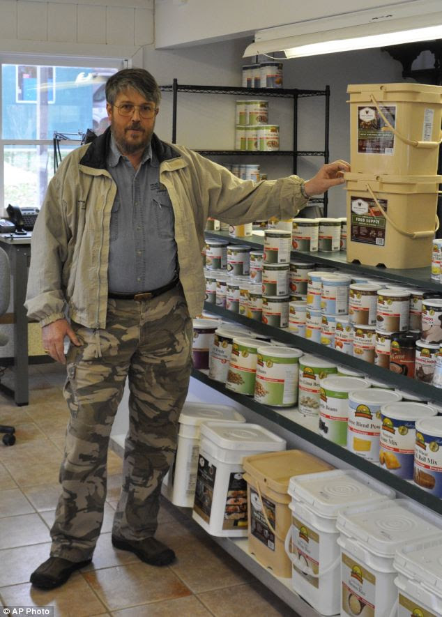 Grab and go: Bill Poteat has been doing a roaring trade in buckets of freeze-dried food at his Southern Survival Supplies store in Morgantown, West Virginia