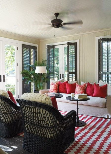 covered porch white sofa coral