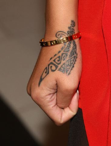 rihanna tattoos meaning. The Shhh tattoo. 11. Rihanna