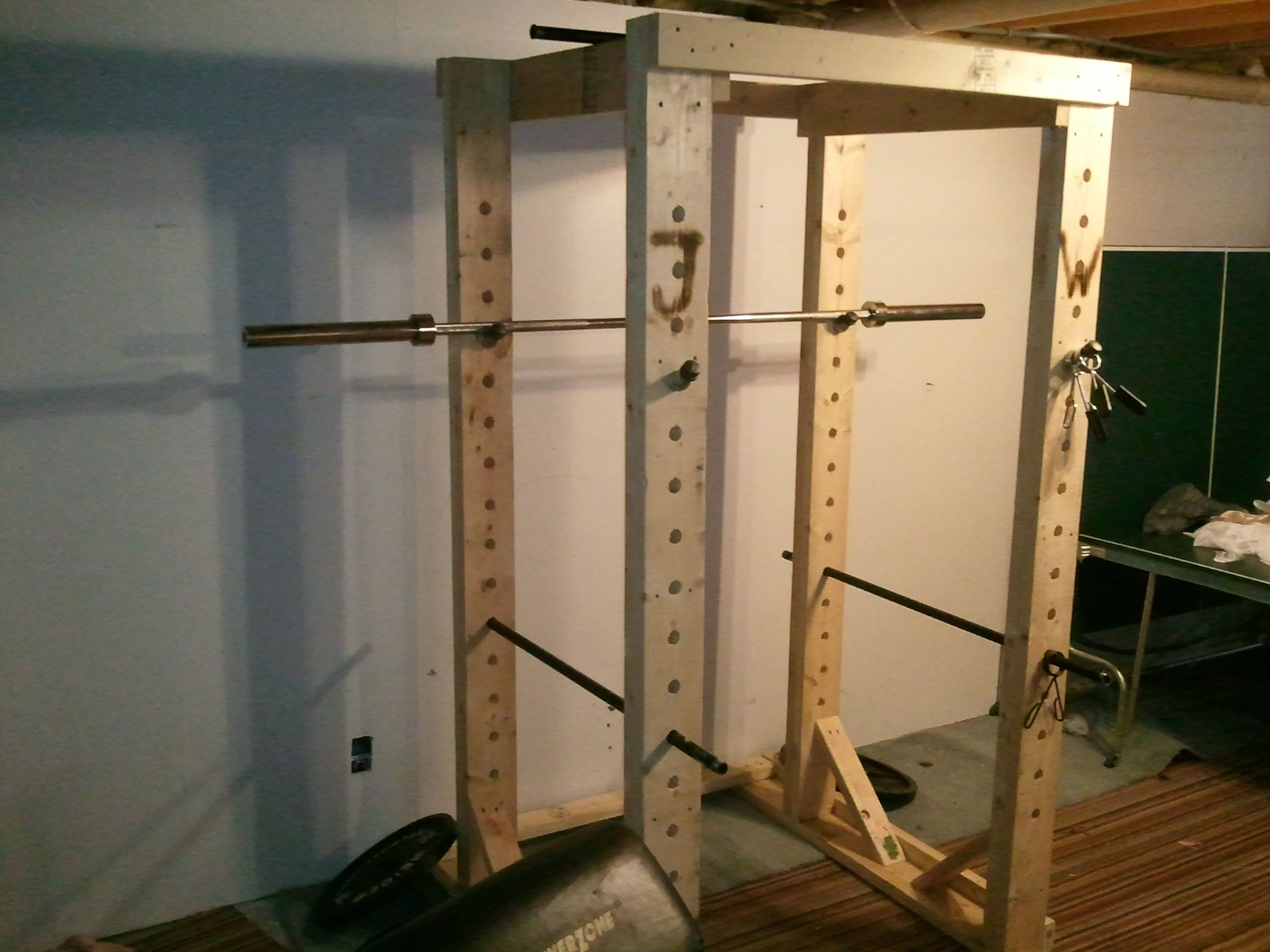 Below is another wooden squat rack option from here .