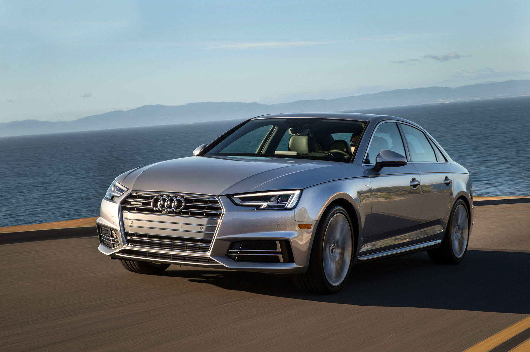 2017 Audi A4 20T quattro front three quarter in motion 01