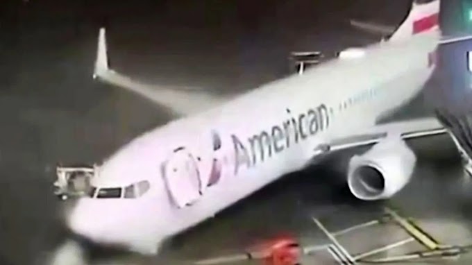 Moment winds push plane away from airport gate in Texas