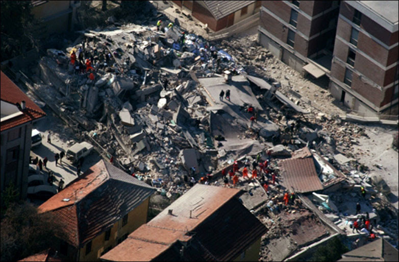 aerial photo provided by the Italian Police shows the debris of a collapsed building in an area near L'Aquila, central Italy, 