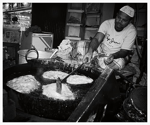 The Malpua Man Of Sulaiman Usman Minara Masjid by firoze shakir photographerno1