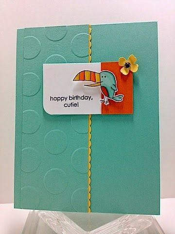 Toucan Cutie. I like the design of this—embossing on one side, the little edgelit peeking out, the rounded corner.