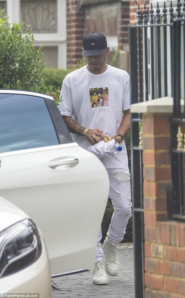 Lewis Hamilton and Rita Ora leave her London home amid ...