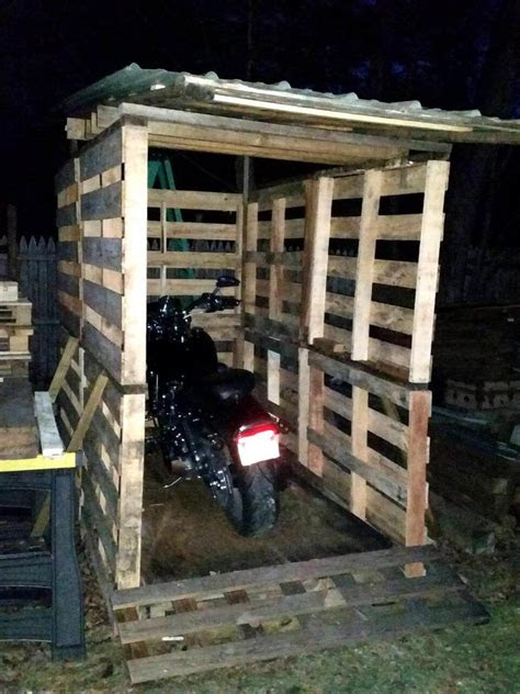 pallet bike shed  tilted metal roof easy pallet ideas