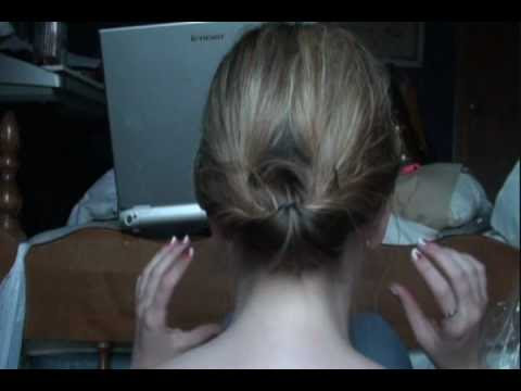 Many women were still sporting the big, soft, Gibson Girl hairstyles on a 