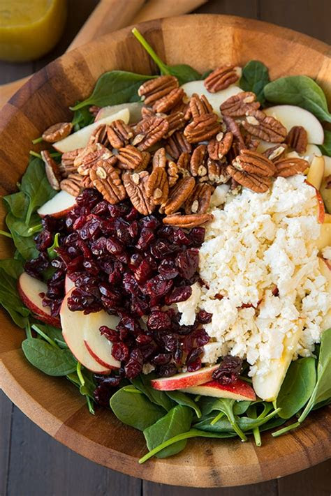 Introducing baby to new foods is an exciting stage of development! Apple Pecan Feta Spinach Salad with Maple Cider