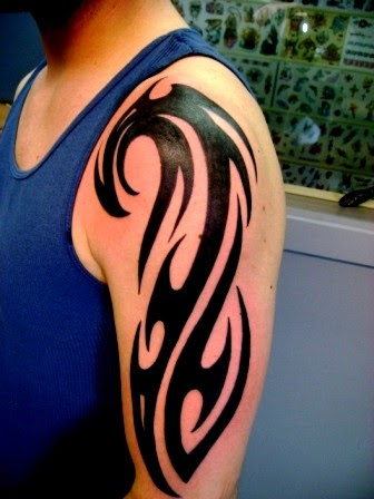 Tribal Tattoos : Lower back tribal tattoos, Tribal back tattoos, Arm tribal