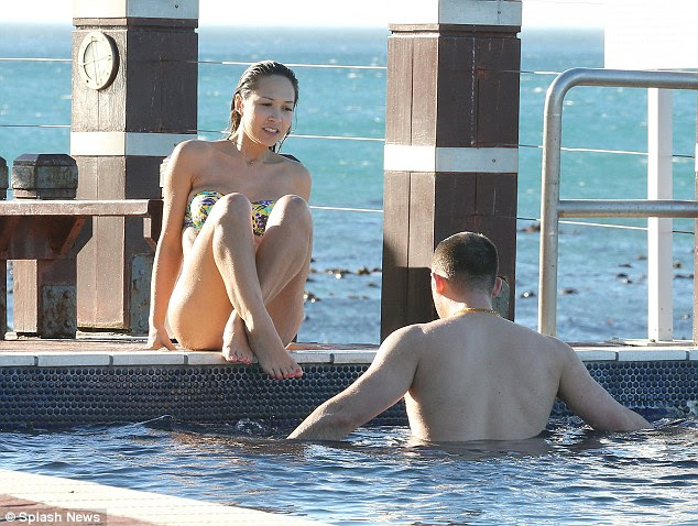 Myleene Klass cools off in a Floral Bikini around the pool in South Africa
