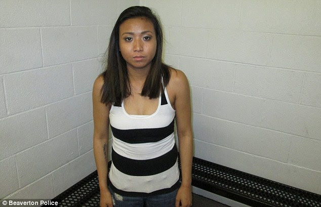 Leokham Yothsombath, 20, filmed the events on her cell phone and was also arrested on Monday