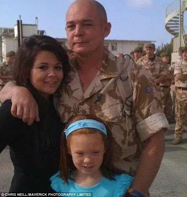Decorated soldier Richard Catterall, pictured with his two daughters, says he was ‘left to rot’ while lawyers hounded him over the death of an Iraqi civilian 12 years ago 