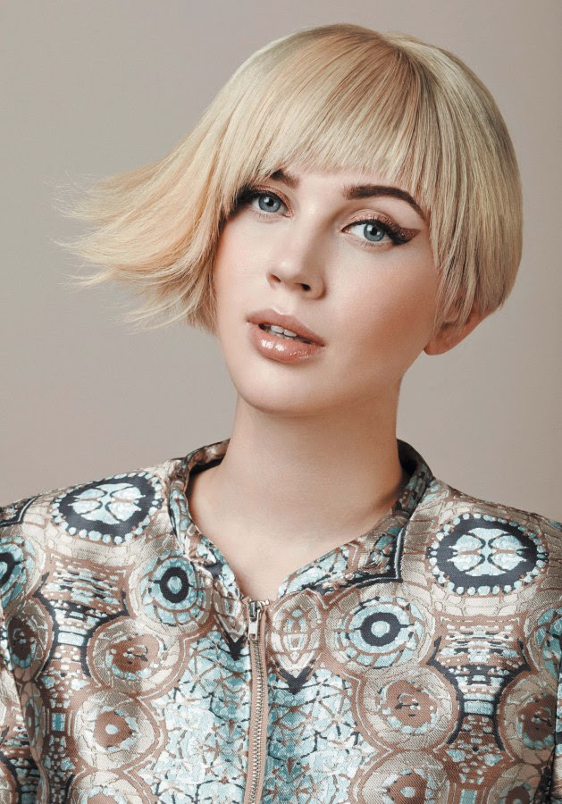 Short asymmetrical bob with razor cut bangs