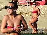 Chloe Geen and family are pictured on the beach in Barbados\n\nRef: SPL916867  231214  \nPicture by: Islandpaps / Splash News\n\nSplash News and Pictures\nLos Angeles: 310-821-2666\nNew York: 212-619-2666\nLondon: 870-934-2666\nphotodesk@splashnews.com\n