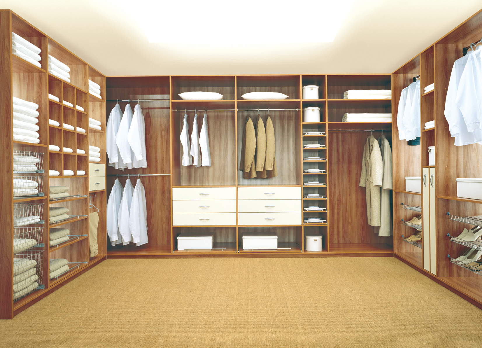 walk in closet or dressing room with shelves and drawers, all made to 