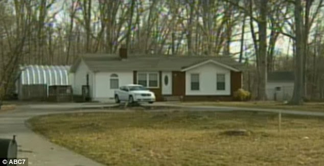 In serious condition: A five-year-old girl had both ears ripped off and suffered bites to her neck and body in a savage attack by her neighbour's dogs at her home (above) in Charles County, Maryland