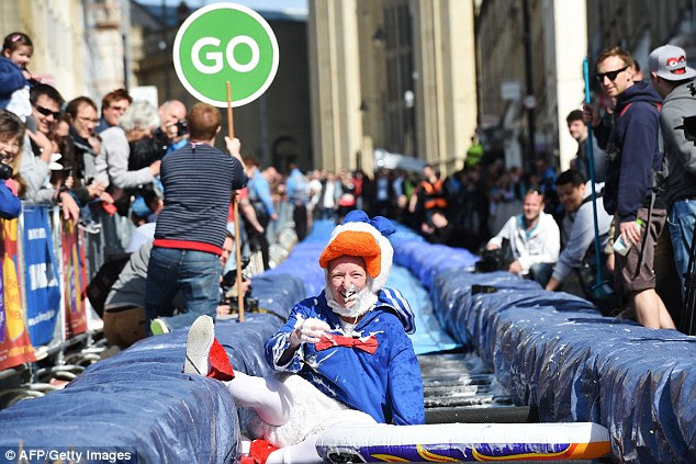 Sunny: A participant dressed in fancy dress takes part in the Bristol Park and Slide project