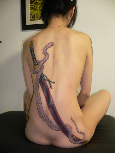 Snack Tattoo On Back Body Girl