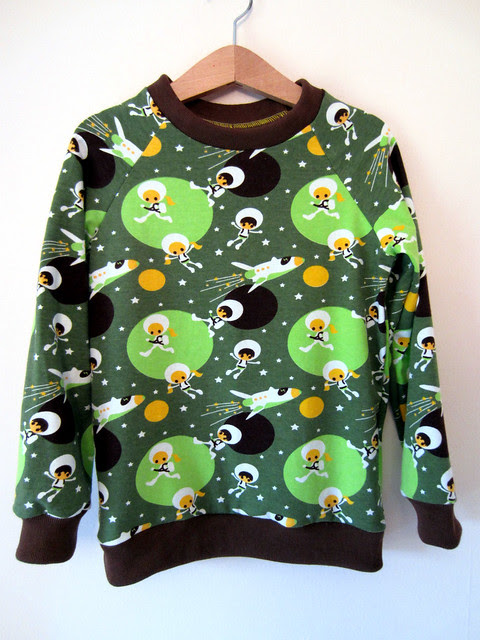 green astronaut top