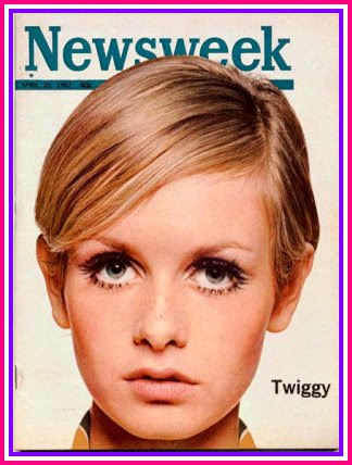 With her short-cropped mod hairstyle, neat side-part, 