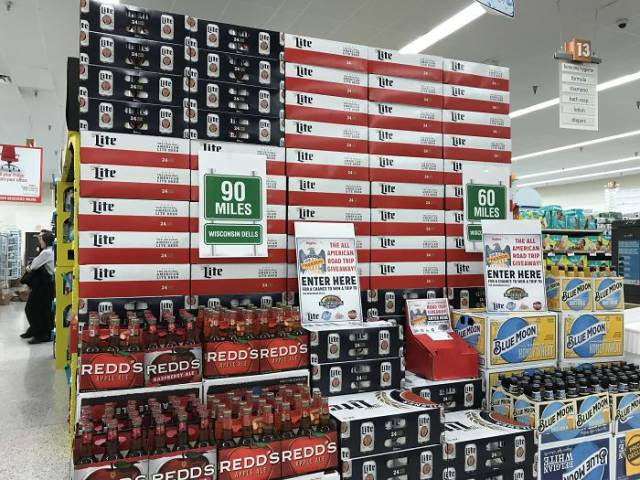 20 - Display of beer cases that is configured to look like the American flag.
