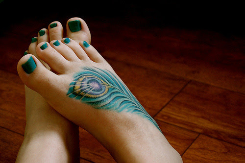 green feet tattoo