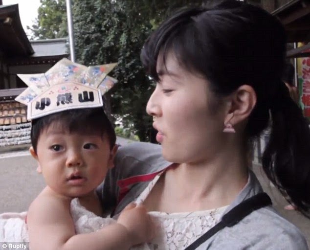 Mari Ichikawac (pictured) said: 'My son got surprised by their loud voices, so he cried. At home he doesn't cry that much'