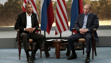 U.S. President Barack Obama (L) meets with Russian President Vladimir Putin during the G8 Summit at Lough Erne in Enniskillen, Northern Ireland, in this June 17, 2013 file photo.  REUTERS/Kevin Lamarque/Files