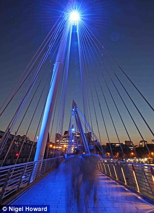 The Golden Jubilee Bridge in London, right