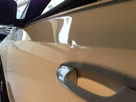 Rust spots can be easily taken care of. Paintless Dent Repair is excellent for removing small