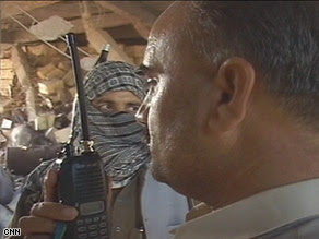 Journalist Shah is shown speaking to Taliban leader Maulana Fazlullah on a walkie-talkie.
