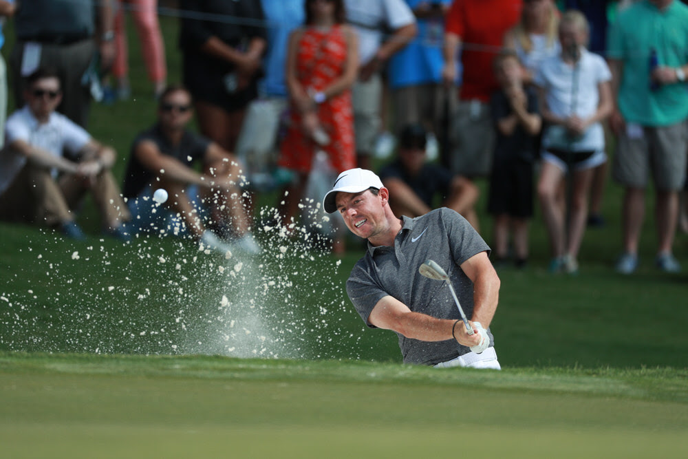 CHARLOTTE, NC - AUGUST 11: Rory McIlroy of Northern Ireland hits out of the bunker on the first hole during Round Two for the 99th PGA Championship held at Quail Hollow Club on August 11, 2017 in Charlotte, North Carolina. (Scott Halleran/PGA of America)