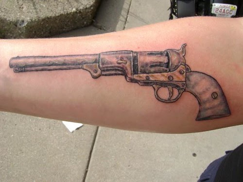 old school revolver gun tattoo. Justin at Kats Like Us Tattoos