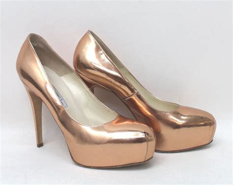 brian atwood ladies copper metallic platform high heel