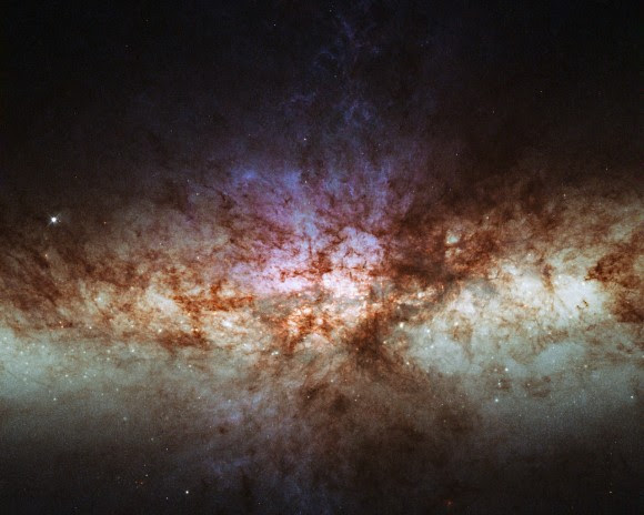 A view of the core of Messier 82 (M82), also known as the Cigar Galaxy. Credit: ESA/Hubble & NASA