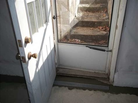 water coming  basement door